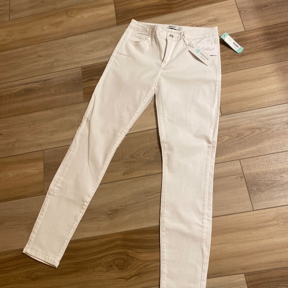 Mid to high rise white jeans